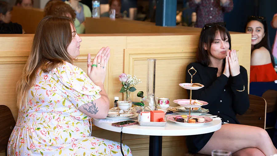 2 ladies having high tea