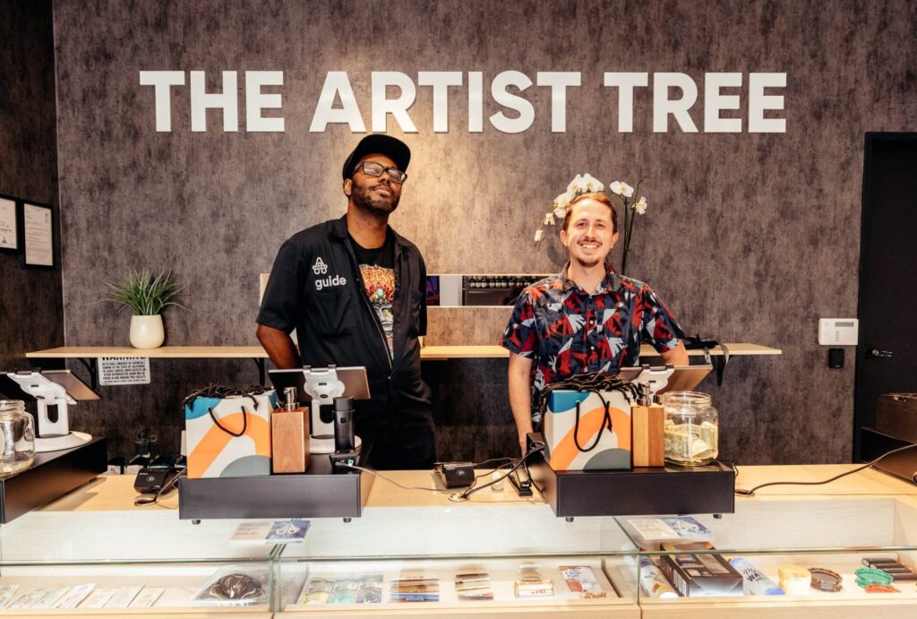 the artist tree shop employees behind the counter